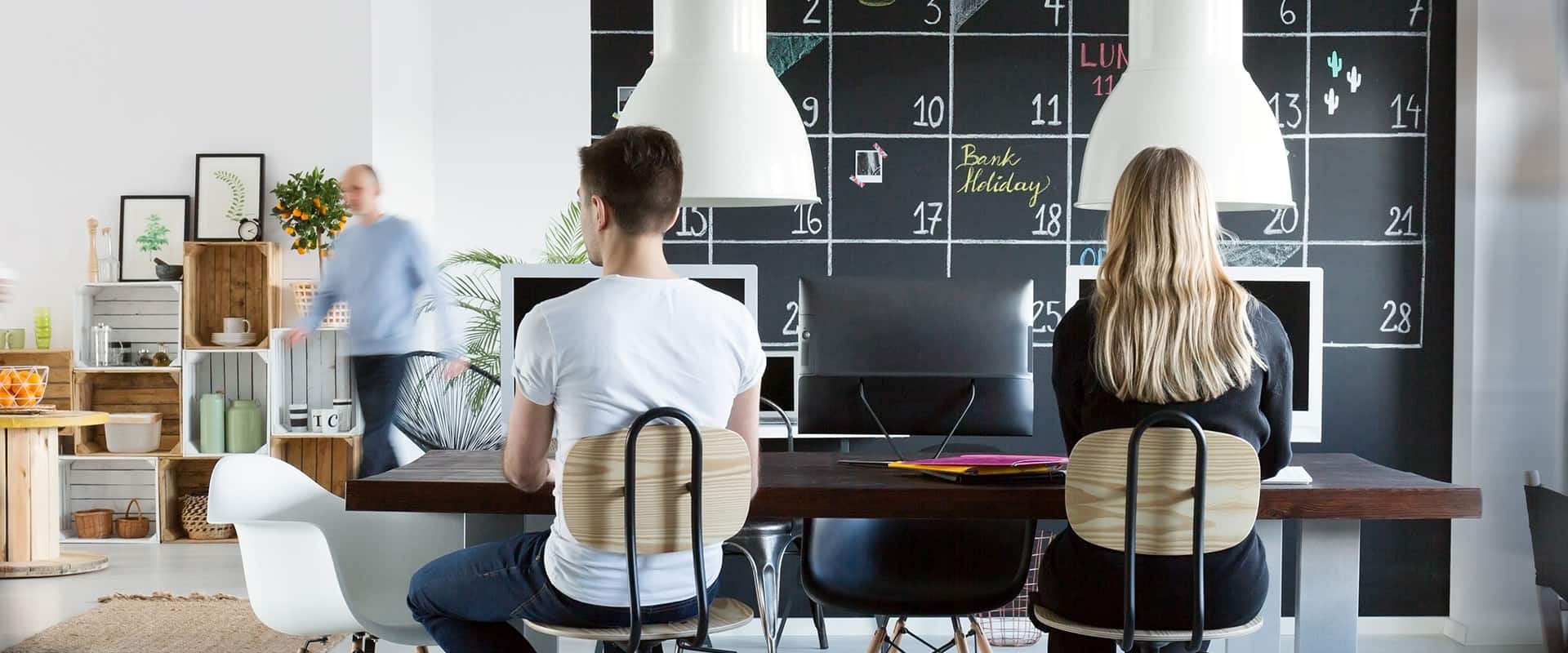 Young people working in trendy friendly office